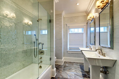 Inspiration for a mid-sized contemporary master bathroom in New York with a shower/bathtub combo, red tile, stone slab, white walls, marble floors, a two-piece toilet, a pedestal sink, an alcove tub, solid surface benchtops, grey floor and a hinged shower door.