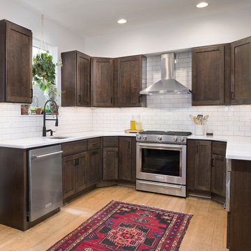 Urban Contemporary Dark Wood Kitchen | White Quartz, Subway Tile & Open Shelving