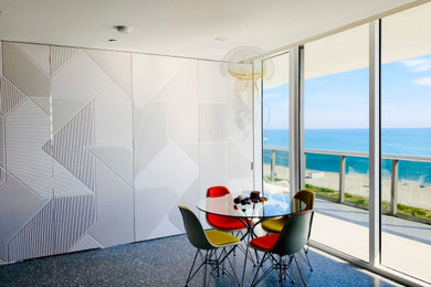 Example of a mid-sized minimalist wood wall kitchen/dining room combo design in Miami with white walls