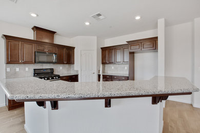 Kitchen - traditional kitchen idea in Other