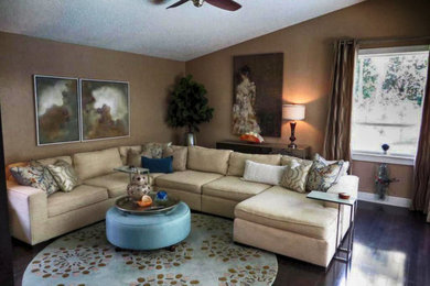 Example of a mid-sized transitional open concept family room design in Phoenix with beige walls, no fireplace and a tv stand