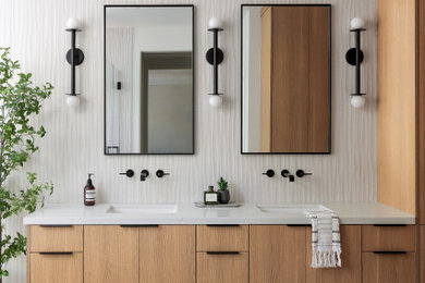 Large minimalist master white tile and ceramic tile ceramic tile, gray floor and double-sink bathroom photo in Orange County with flat-panel cabinets, light wood cabinets, a one-piece toilet, white walls, a drop-in sink, quartzite countertops, a hinged shower door, white countertops and a built-in vanity