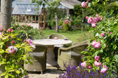 Large traditional back full sun garden for summer.