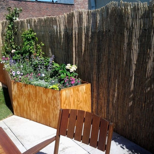 Kleiner, Halbschattiger Eklektischer Dachgarten im Sommer mit Betonplatten in New York