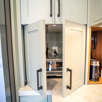 Sage Green Kitchen Cabinets With Custom Storage In Oakville