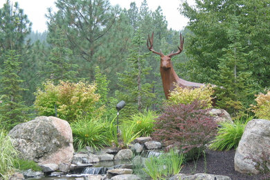 Design ideas for a traditional water fountain landscape in Seattle.