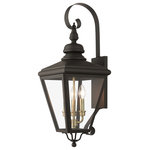 Livex Lighting Inc. - 3 Light Bronze Outdoor Large Wall Lantern, Antique Brass - The stylish bronze finish outdoor Adams large wall lantern is a great way to update your home's exterior decor. A flat metal curved arm attaches the solid brass decorative housing to the square backplate while clear glass shows off the antique brass finish cluster.