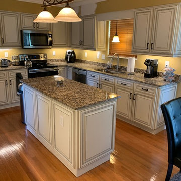 Cabinet reface with granite and new wall of cabinets