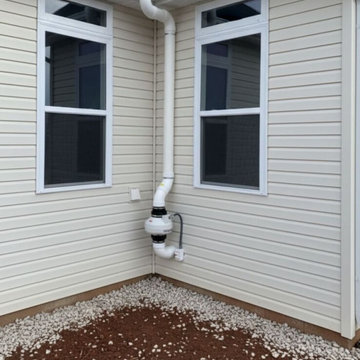 Corner-Fit Exterior Radon Mitigation System