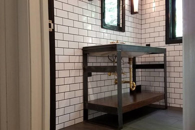 Mid-sized urban 3/4 white tile and subway tile porcelain tile and black floor bathroom photo in Other with open cabinets