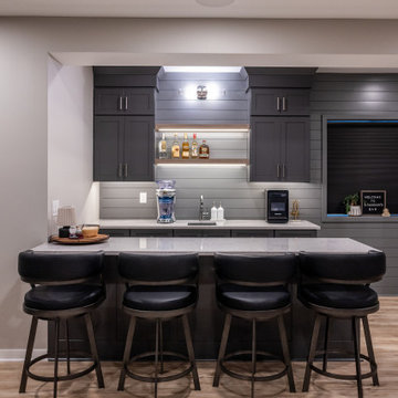 Shawnee, KS Basement Remodel with Custom Bar & Golf Simulator