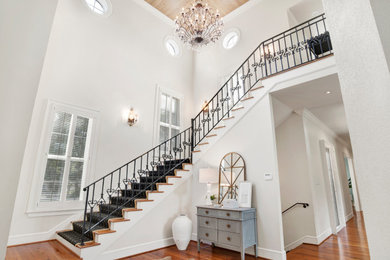 Example of a transitional staircase design in Other