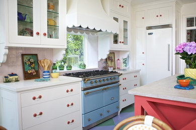 Open concept kitchen - eclectic painted wood floor open concept kitchen idea in Los Angeles with white cabinets, wood countertops, ceramic backsplash, colored appliances and shaker cabinets