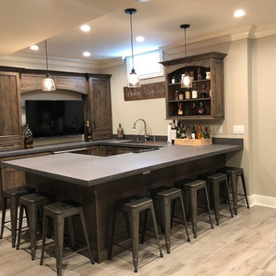 75 Beautiful Farmhouse Home Bar With Solid Surface Countertops