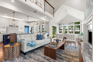 Inspiration for a cottage loft-style shiplap wall, medium tone wood floor and brown floor living room remodel in Boston with a ribbon fireplace, a stone fireplace and white walls