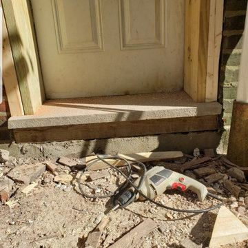 Door repair. Reframe doorway on cement slab.