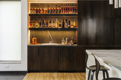 Inspiration for a contemporary home bar remodel in Kansas City
