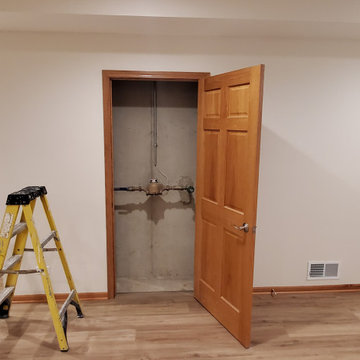 Finished basement water main access