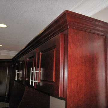 Modern Kitchen Remodel Done In a Cherry Veneer and Burgundy Stain