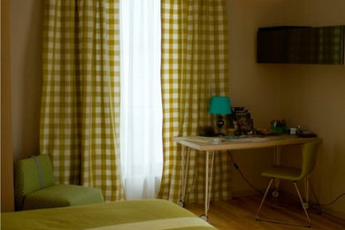 Photo of a contemporary kids' room in Saint Petersburg with green walls.