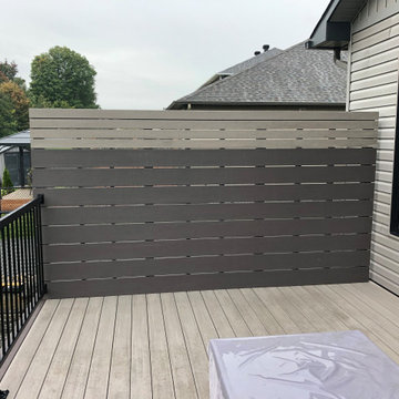 Coastline & Dark Hickory walkout with privacy screen