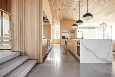 Kitchen - contemporary kitchen idea in Portland with an island