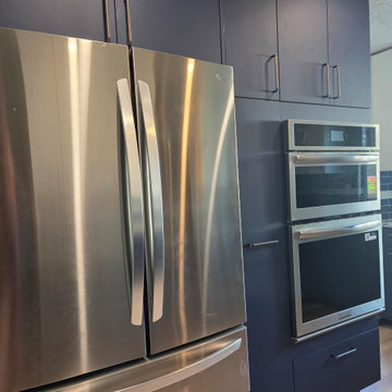Blue and White Kitchen with Tiled Pass Through