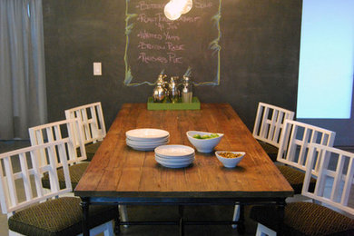 Kitchen/dining room combo - mid-sized modern concrete floor kitchen/dining room combo idea in Los Angeles with black walls