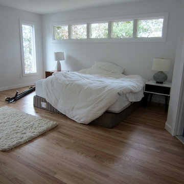 EAST HAMPTON 2 1/4" RED OAK INSTALLED & FINISHED W BONA AMBERSEAL AND TRAFFIC HD