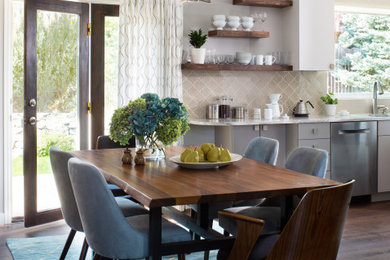 Inspiration for a mid-sized 1960s dark wood floor kitchen/dining room combo remodel in Denver with gray walls