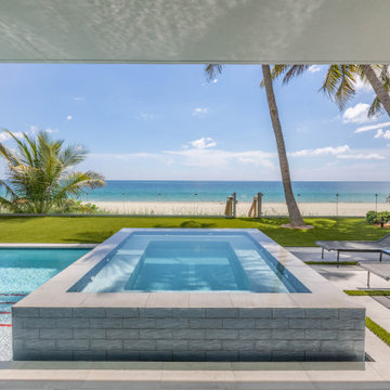Custom Swimming Pool & Spa That Goes Underneath Part of the The House