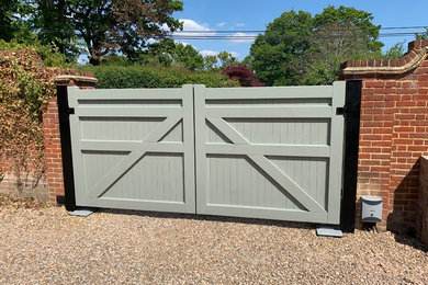 Hardwood gates painted a Farrow&Ball colour to match the windows of the house