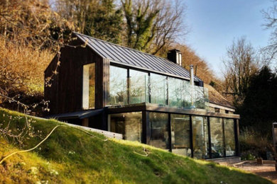 This is an example of a contemporary garden shed and building in Gloucestershire.