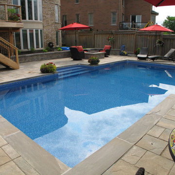 Pool with Patio Seating and Fire Pit