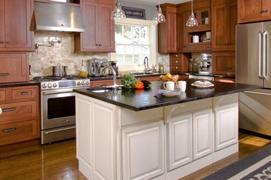 Example of a transitional kitchen design in New York