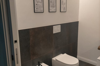 Design ideas for an industrial powder room in Turin.