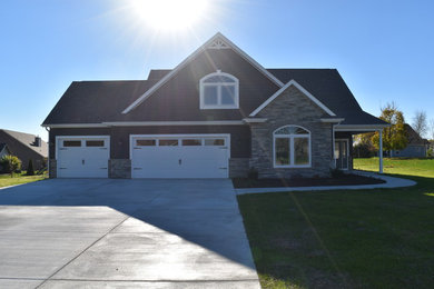 Mid-sized transitional blue two-story concrete fiberboard gable roof idea in Other