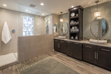 Inspiration for a large contemporary master porcelain tile porcelain tile doorless shower remodel in Phoenix with shaker cabinets, dark wood cabinets, beige walls and a vessel sink