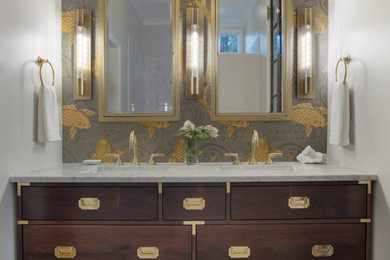 Example of a large eclectic master white tile and marble tile marble floor, white floor, double-sink and wallpaper bathroom design in Atlanta with flat-panel cabinets, brown cabinets, an undermount sink, marble countertops, white countertops, a niche and a built-in vanity