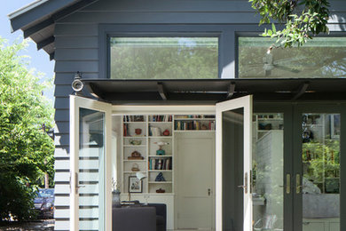 Inspiration for a contemporary porch remodel in Austin with an awning