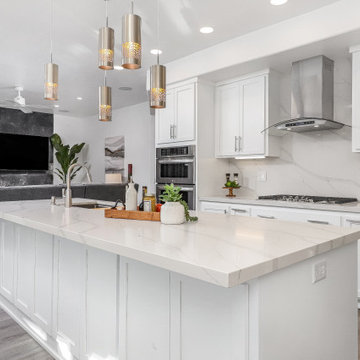 Custom Kitchen Remodel with White Shaker Cabinetry, Grey Veined Quartz and Conte
