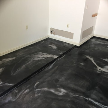 Metallic epoxy in a show room garage