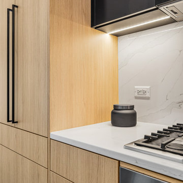 Sophisticated matte black and warm rift cut oak collision