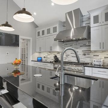 Absolute Black Kitchen with Waterfall Edge