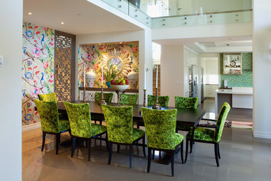 This is an example of a transitional open plan dining in Brisbane with multi-coloured walls and no fireplace.