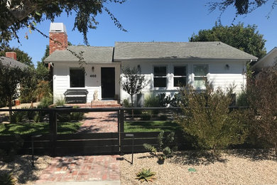 Photo of a beach style home design in Orange County.