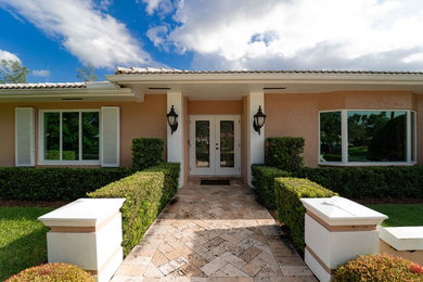 Photo of a traditional home design in Miami.