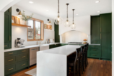 Kitchen - transitional kitchen idea in Minneapolis with a farmhouse sink, shaker cabinets, quartzite countertops, white backsplash, an island and white countertops