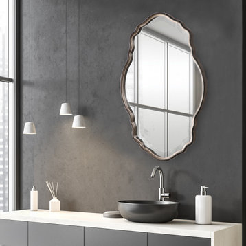 Antiqued Silver Champagne Accented With A Dark Bronze Outer Edge. Mirror