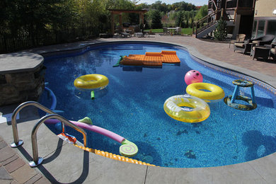 Beach style pool photo in Minneapolis